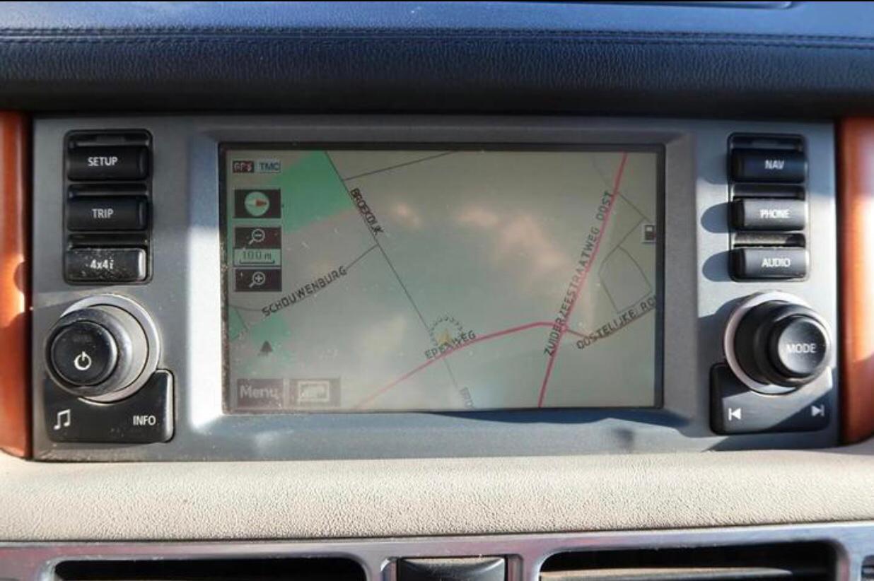 Car navigation and audio electronics installed in a vehicle dashboard